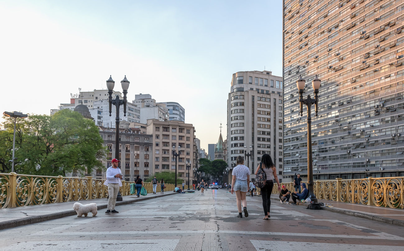 People crossing the Santa Ifigenia viaduct in Sao Paulo downtown latin american marketing franchises